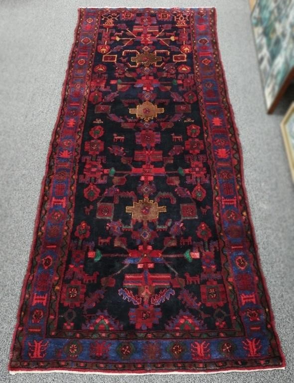 Appraisal: Vintage hand tied Heriz Serapi wide runner Rug has dark