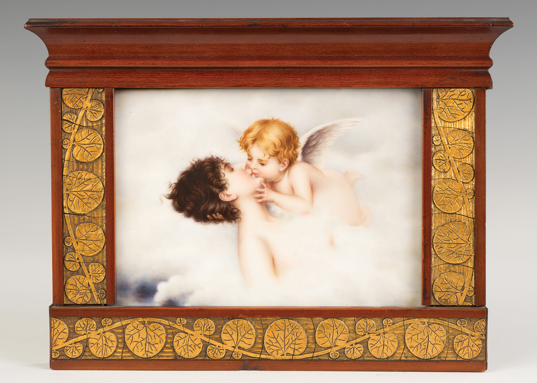 Appraisal: Painting on Porcelain of a Cupid Kissing a Woman In