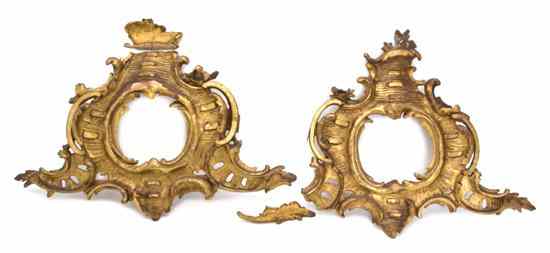 Appraisal: A Pair of Italian Rococo Giltwood Frames each of cartouche