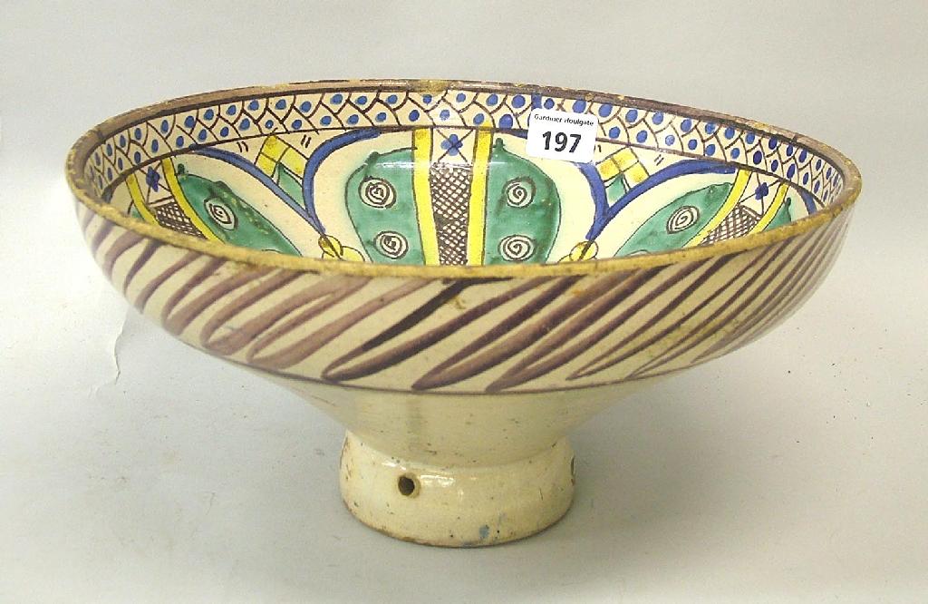 Appraisal: th century Moroccan pottery polychrome painted stem bowl decorated with