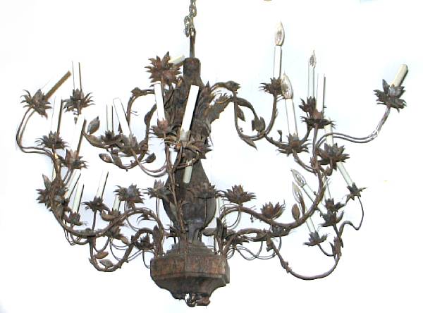 Appraisal: An Art Nouveau tole and wrought metal thirty-six light chandelier