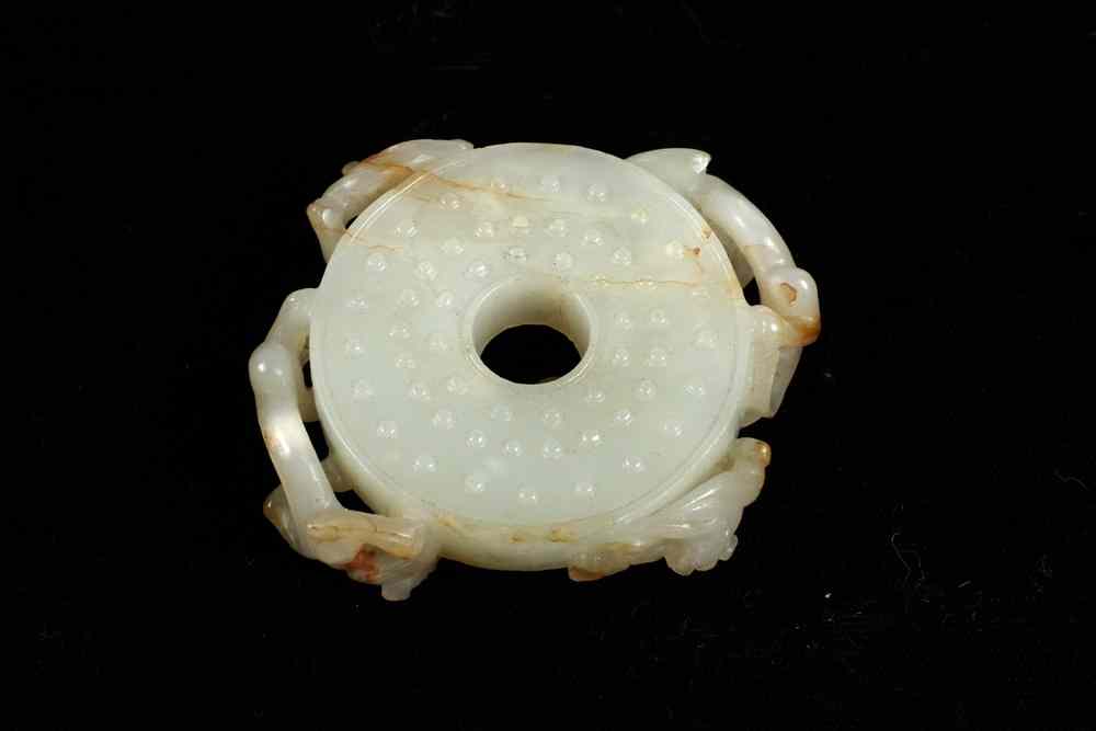 Appraisal: CARVED JADE PI - Ming dynasty - A D elegantly