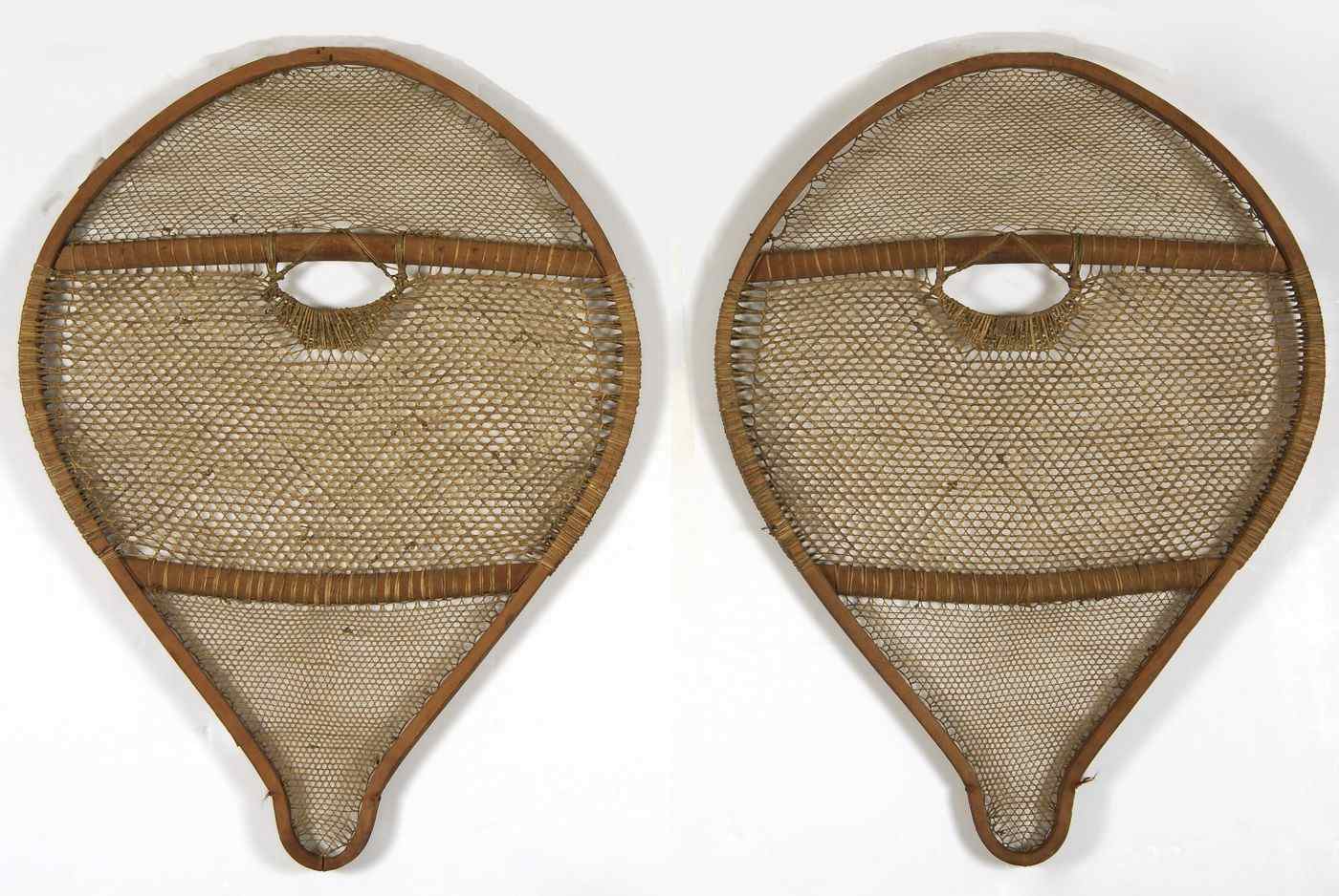 Appraisal: PAIR OF UNUSUAL NATIVE AMERICAN SNOWSHOESLate th Early th CenturyProbably