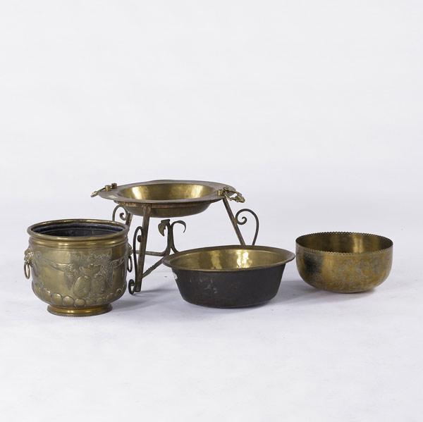 Appraisal: FOUR BRASS POTS One on iron stand th C Largest