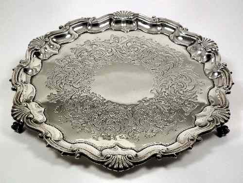 Appraisal: A Victorian silver circular salver with piecrust edge and shell