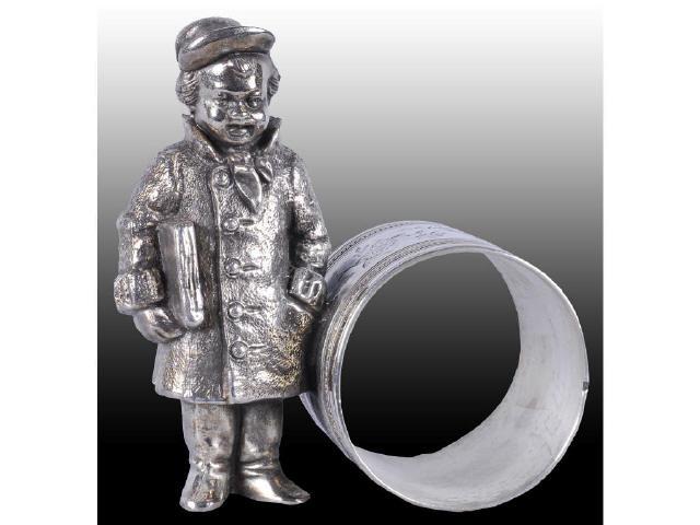 Appraisal: Young Boy with Newspaper Figural Napkin Ring Description Young boy