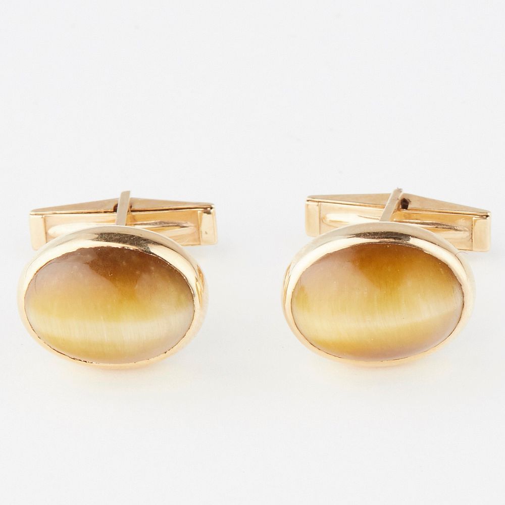 Appraisal: Pair of Oval K Gold Tiger Eye Cufflinks Pair of