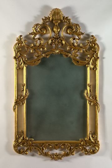 Appraisal: Large Italian Carved Giltwood Looking Glass with a tall upright