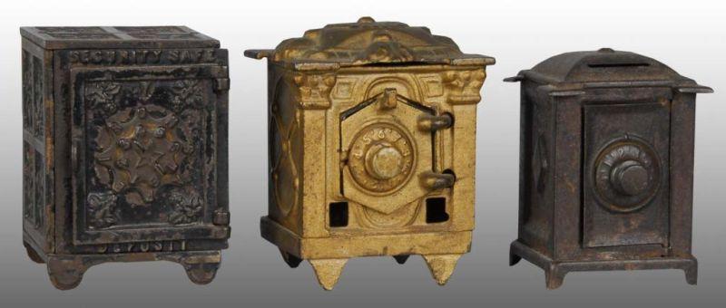 Appraisal: Lot of Cast Iron Tin Safe Still Banks Condition Good