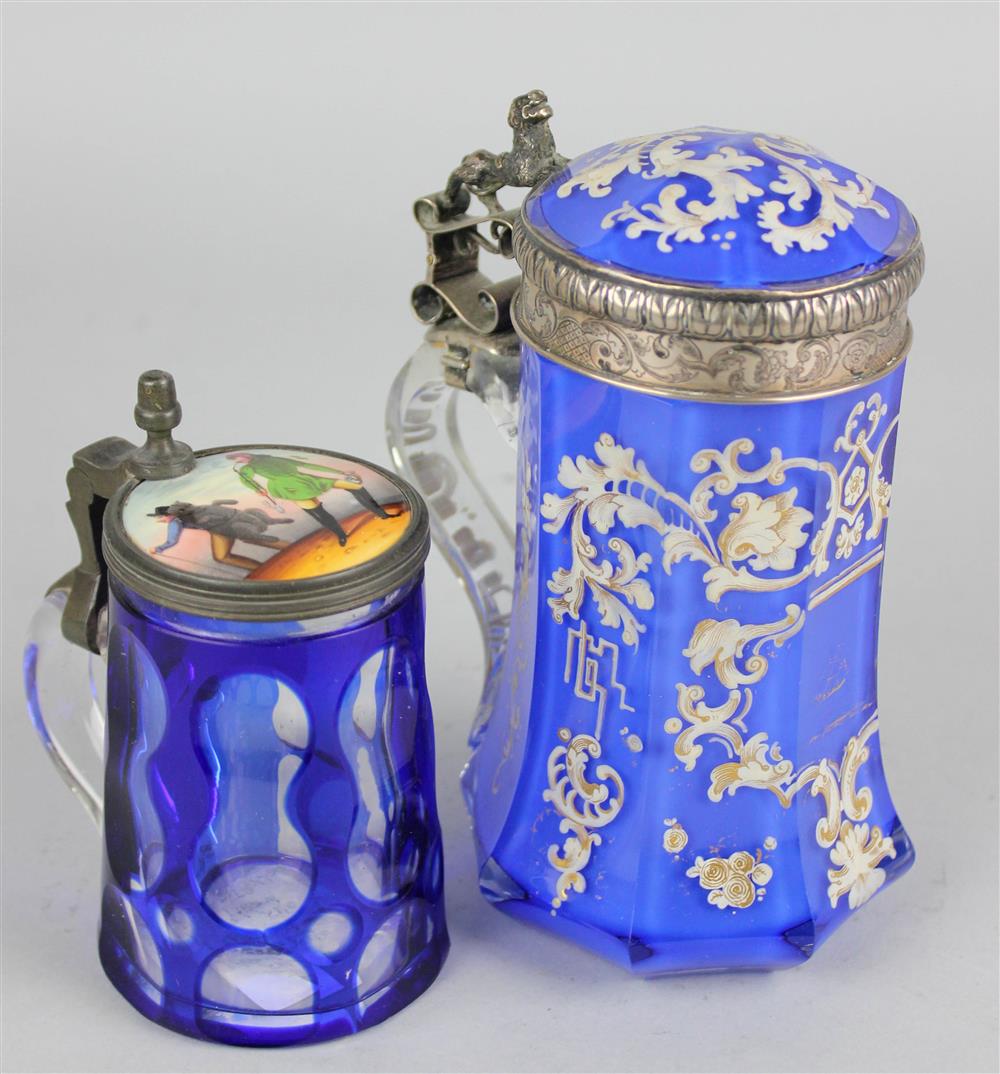 Appraisal: TWO BOHEMIAN BLUE GLASS STEINS th Century each with colorless