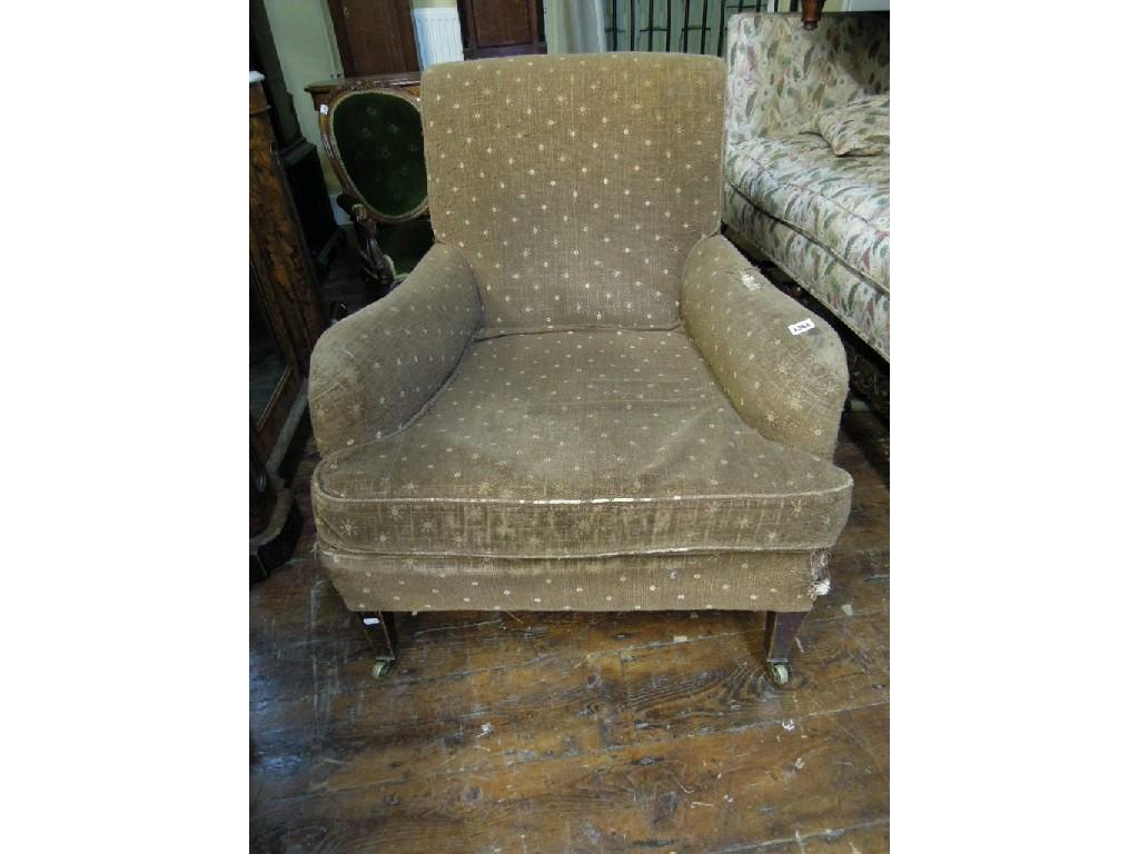 Appraisal: A late Victorian Edwardian easy chair in the Howard style