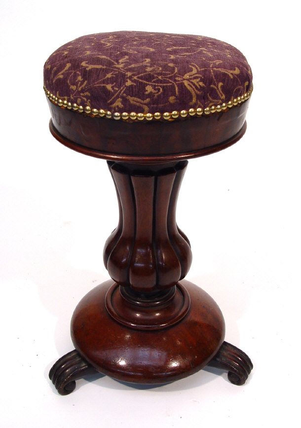 Appraisal: Victorian mahogany stool on a fluted bulbous base cm high