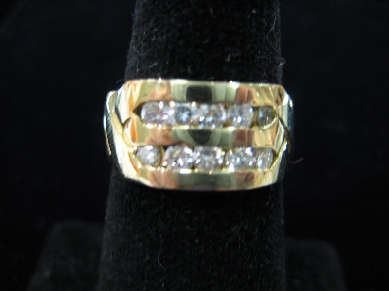 Appraisal: DIAMOND RING Yellow gold ring set with ten round brilliant