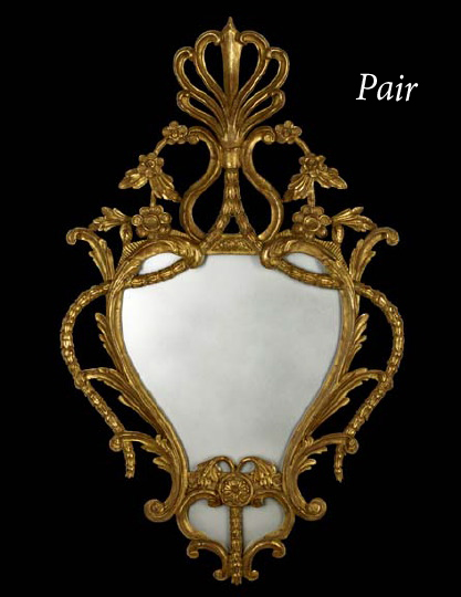 Appraisal: Pair of Continental Carved Giltwood Looking Glasses each with a