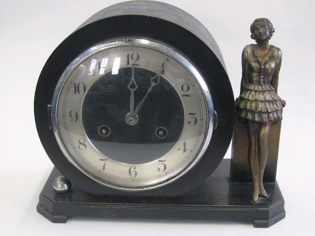 Appraisal: Art Deco wooden cased mantel clock with a painted spelter