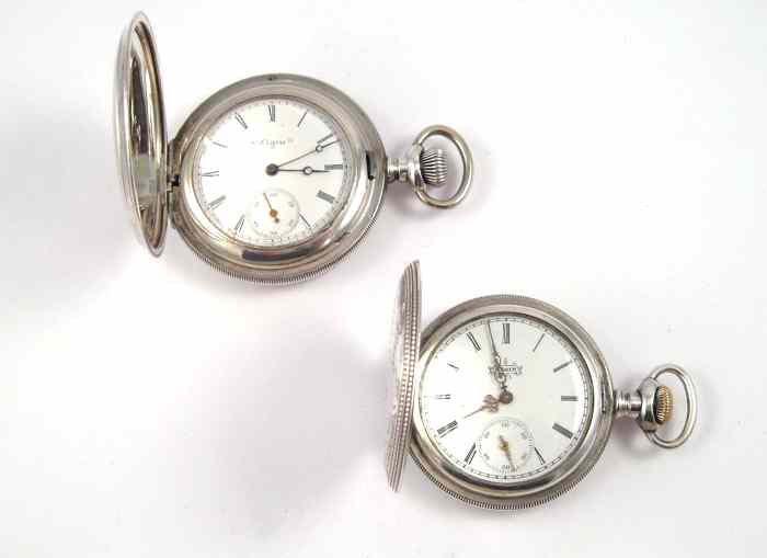 Appraisal: TWO ELGIN SILVER HUNTER CASE POCKET WATCHES A model size