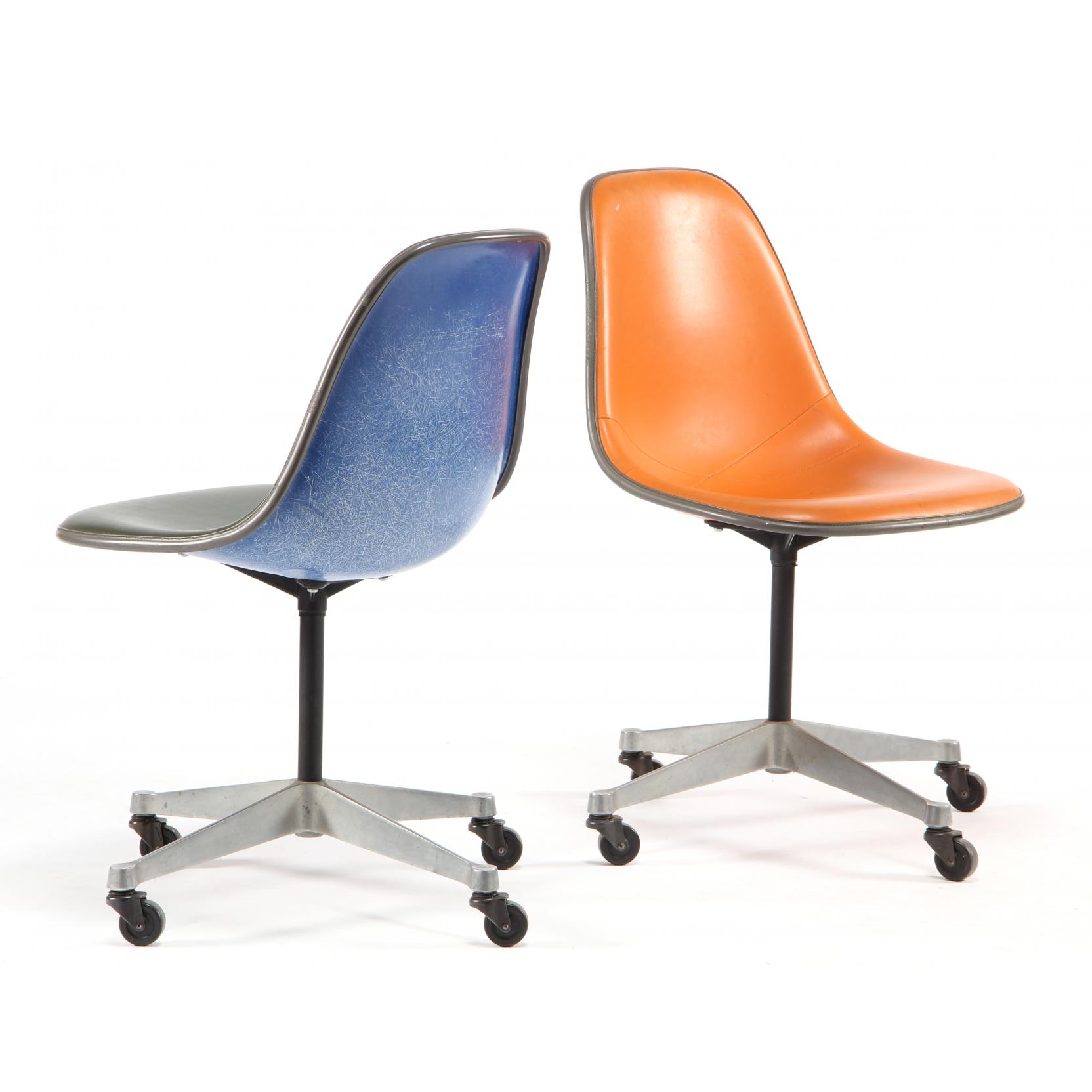 Appraisal: Charles and Ray Eames Two Swivel Chairs Herman Miller molded