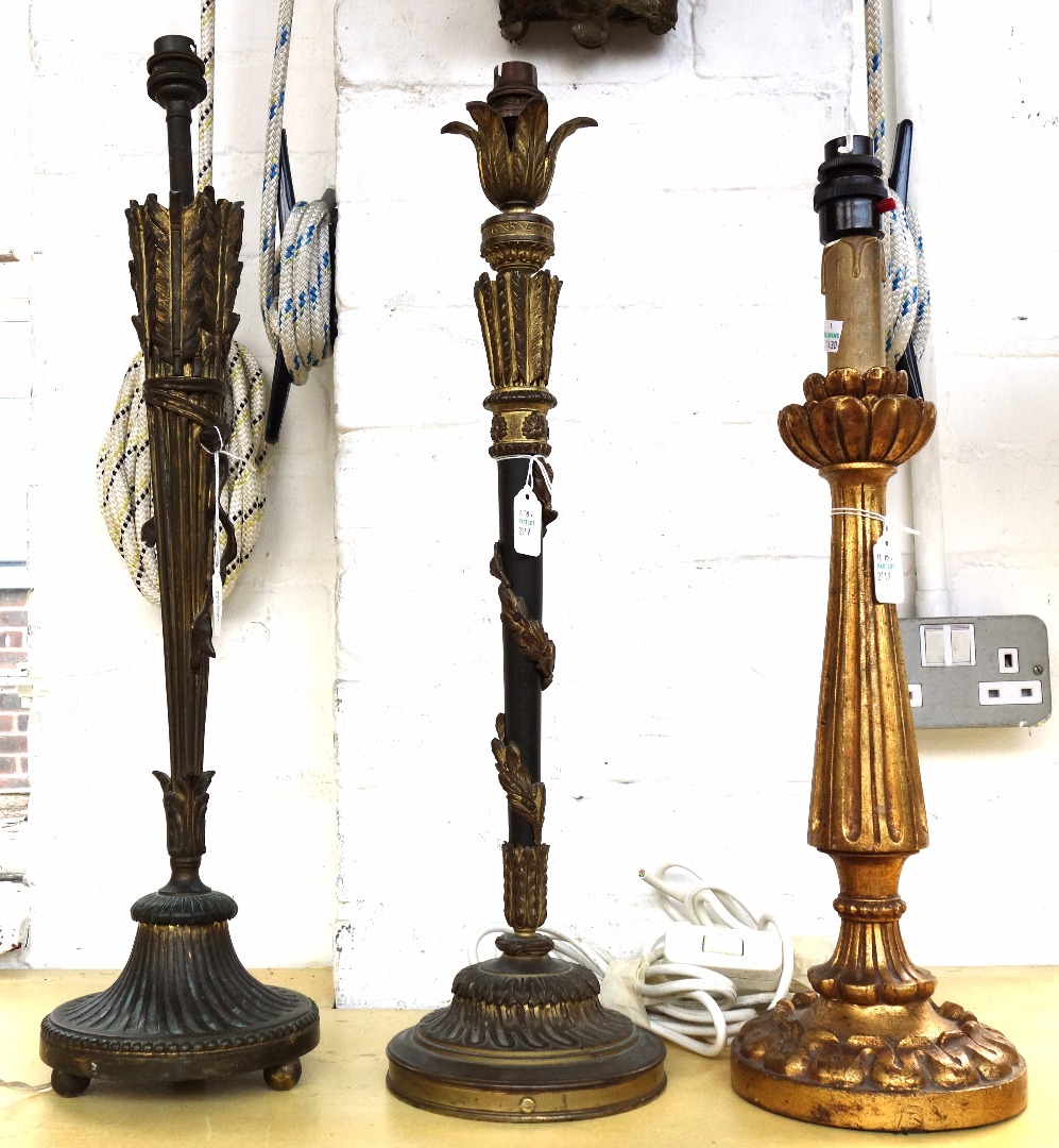 Appraisal: A brass table lamp early th century cast as a