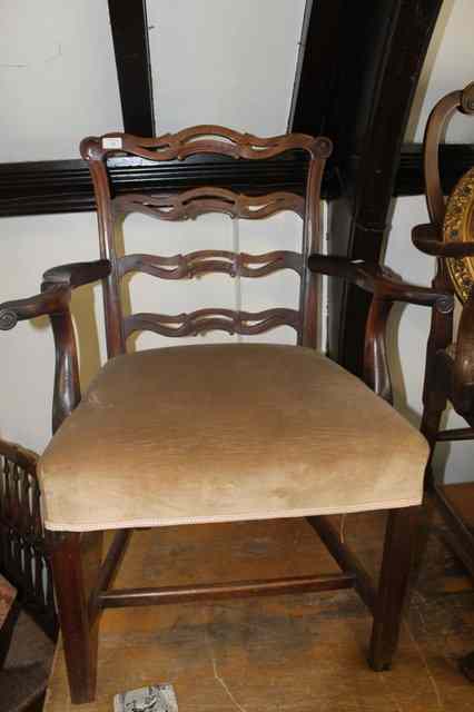 Appraisal: A GEORGE III MAHOGANY SHAPED LADDER BACK ELBOW CHAIR with