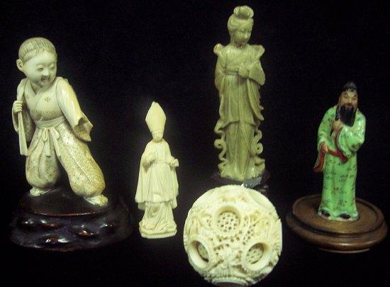 Appraisal: A Japanese ivory okimono circa depicting a young boy cm