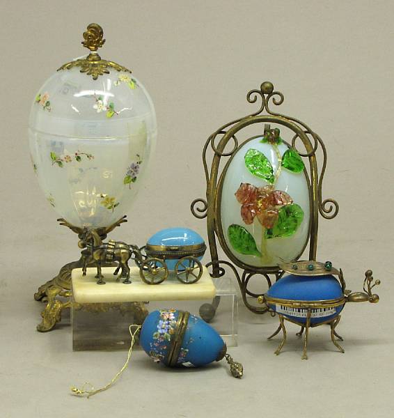 Appraisal: A group of five glass and gilt brass mounted egg