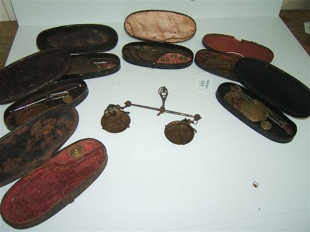 Appraisal: SIX SETS OF GEORGIAN IRON AND BRASS COIN SCALES in