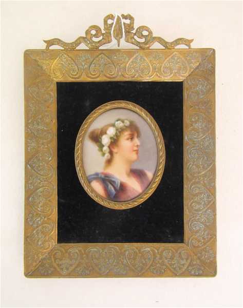 Appraisal: A FRENCH MINIATURE PORTRAIT OIL ON PORCELAIN of a young