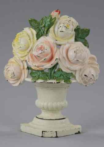 Appraisal: ROSES DOORSTOP Hubley cast iron lovely pastel arrangement simulated in