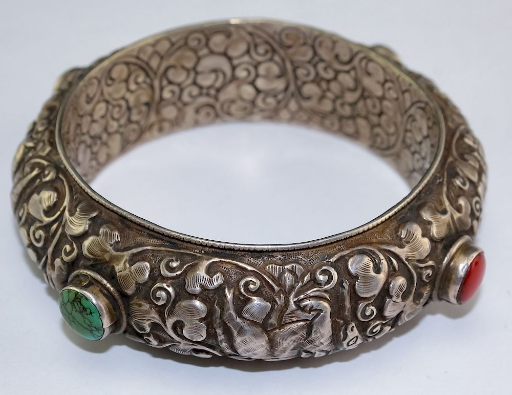 Appraisal: Asian Repousse Animals Flowers Turquoise Bangle Vintage repousse bracelet Features