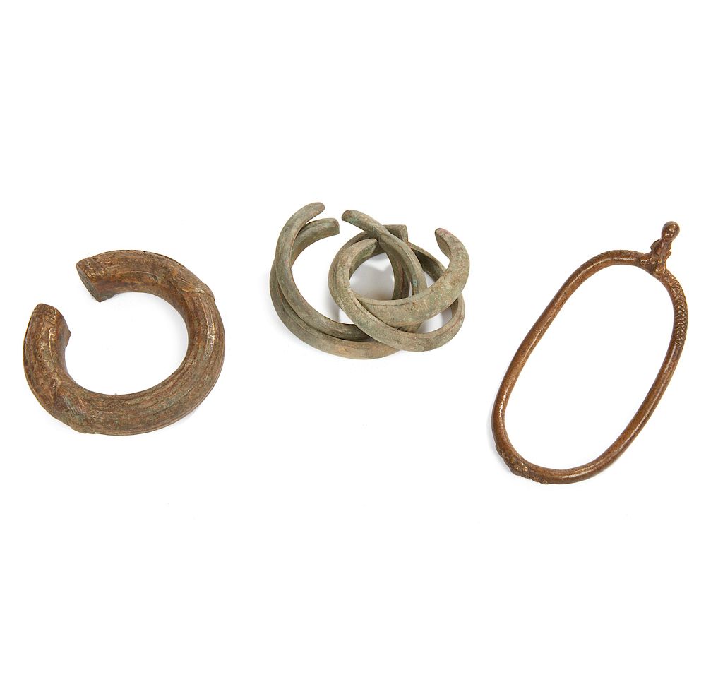 Appraisal: Three African Bronze Cuffs Three African bronze cuffs used as