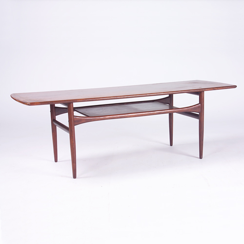 Appraisal: SCANDINAVIAN ARREBO Rosewood coffee table with rectangular top and lower