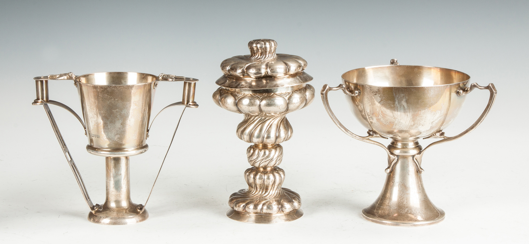 Appraisal: Two Sterling Silver Handled Cups A German Silver Chalice L