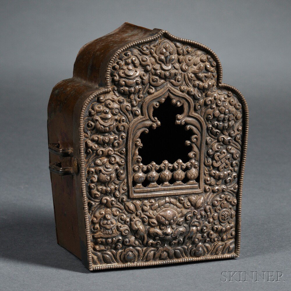 Appraisal: Metal Gau Box Tibet th th century rectangular with ogee