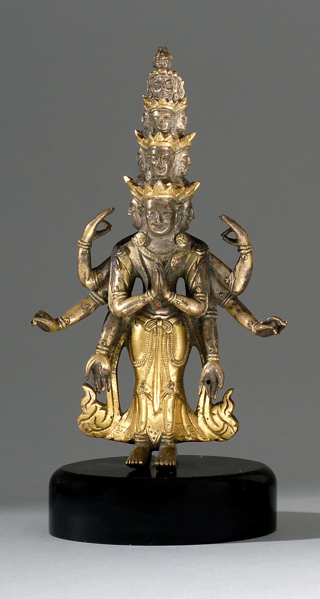 Appraisal: SINO-TIBETAN GILT-BRONZE FIGURE th CenturyIn the form of an eight-armed