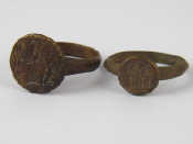 Appraisal: A mixed lot comprising two bronze rings probably Byzantine