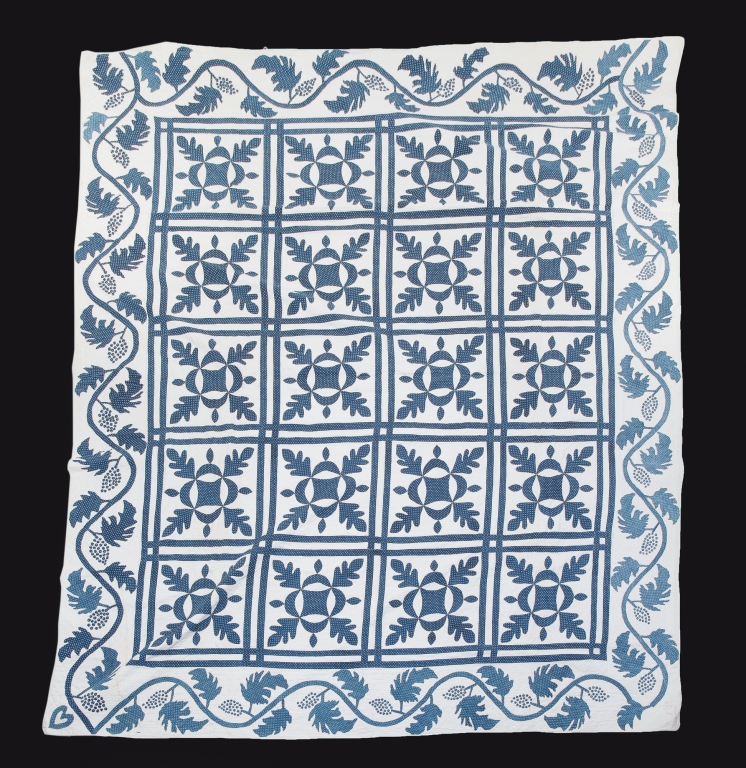 Appraisal: Partial cross stitched initials and dated Blue floral grid pattern