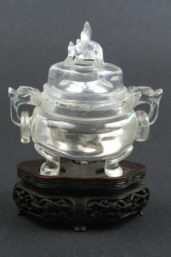 Appraisal: AN ARTIST SCULPTED ROCK CRYSTAL COVERED JAR with ring handles