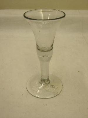 Appraisal: A LATE th CENTURY WINE GLASS with flared top tear