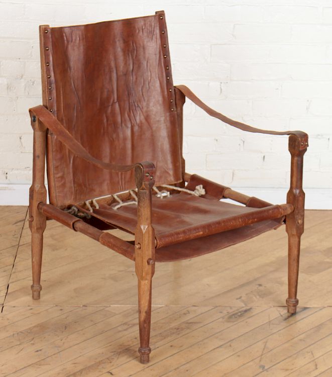 Appraisal: CAMPAIGN STYLE WOOD FRAME CHAIR LEATHER C A Campaign style