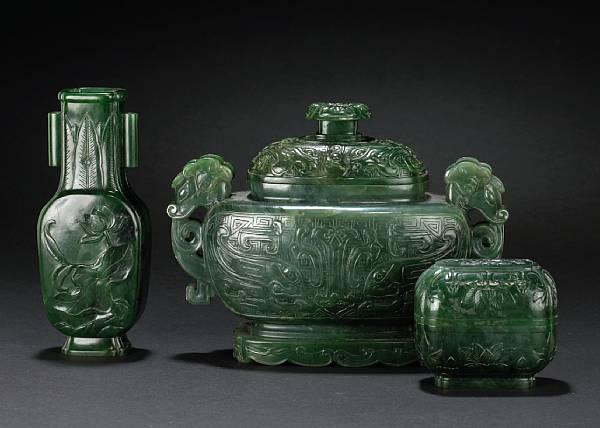 Appraisal: A three-piece 'spinach' jade garniture The first a covered box