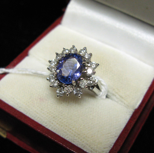 Appraisal: TANZANITE DIAMOND AND FOURTEEN KARAT WHITE GOLD RING Sixteen round-cut