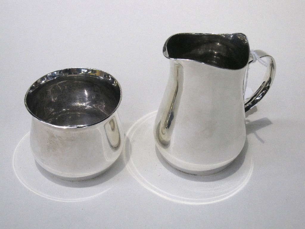 Appraisal: Silver cream and sugar designed by Eric Clements oz London