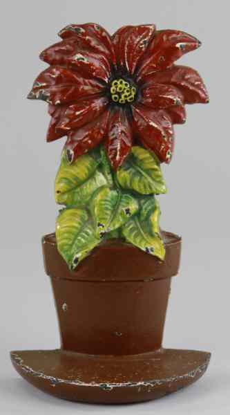 Appraisal: POINSETTIA DOORSTOP Judd Co '' '' cast iron desirable doorstop