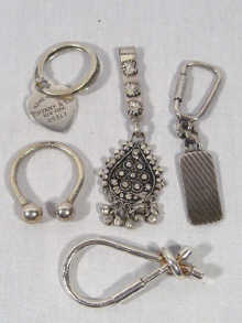 Appraisal: A mixed lot comprising a Tiffany key ring and three