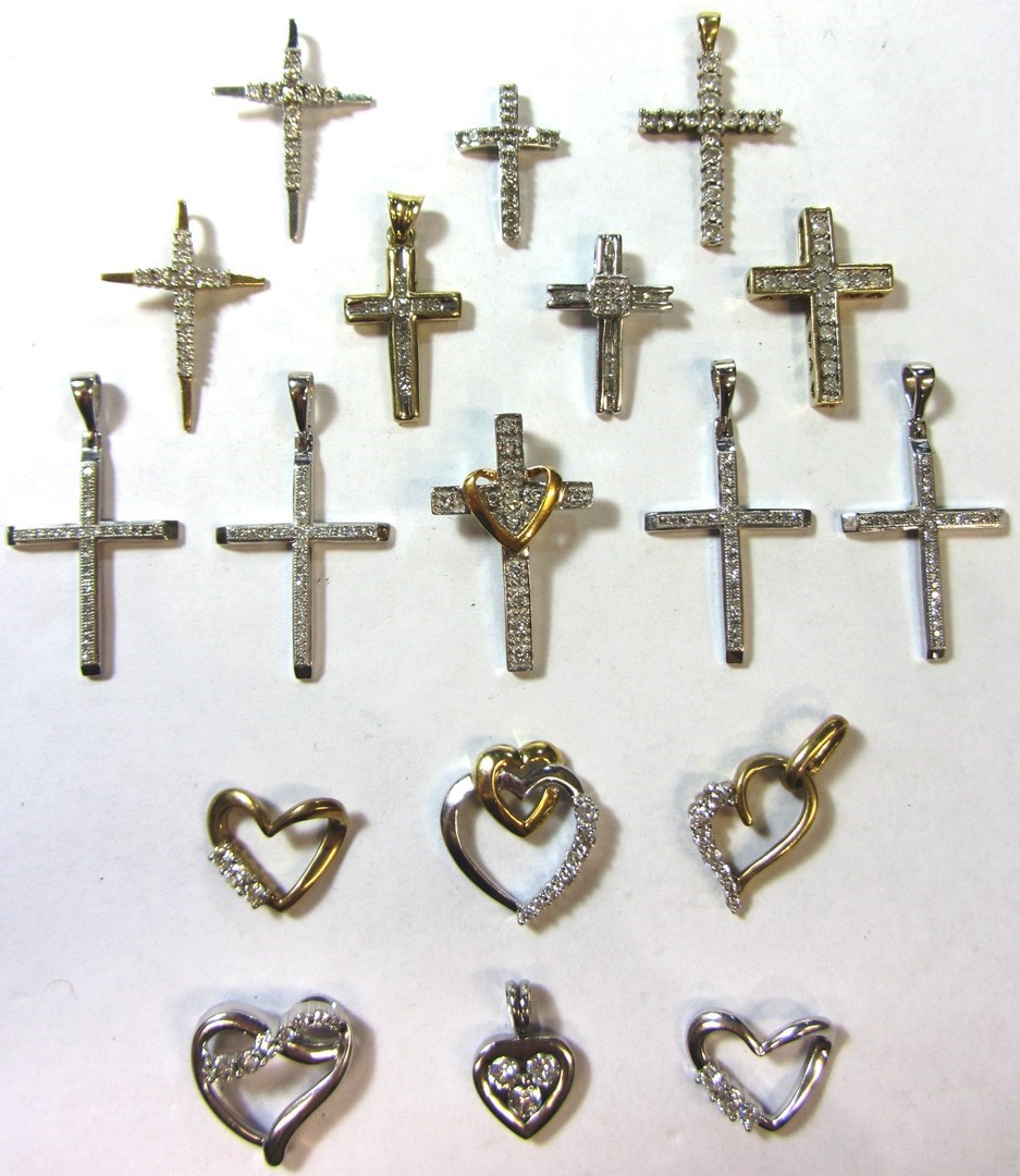 Appraisal: A quantity of modern diamond pendants comprising six various open