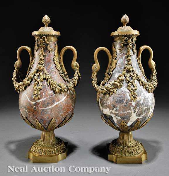 Appraisal: A Pair of Decorative Louis XV-Style Cassolettes having variegated marble