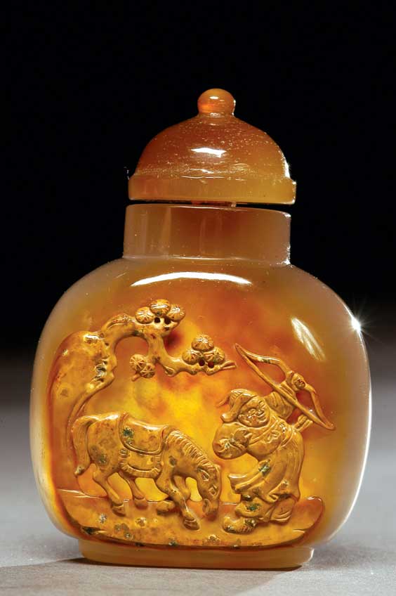 Appraisal: CAMEO AGATE SNUFF BOTTLE Finely hollowed carved translucent cameo agate