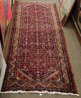 Appraisal: Hamadan runner with blue ground Hamadan runner with blue ground