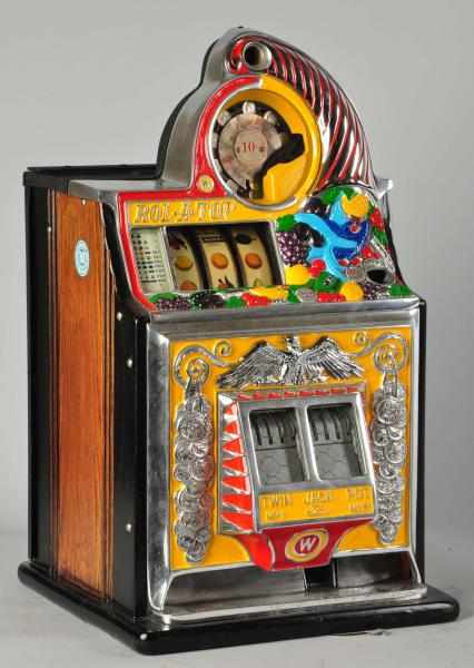 Appraisal: Watling Bird of Paradise Coin-Op Machine Original door locks and