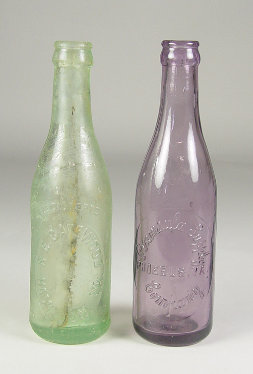 Appraisal: Two Soft Drink Bottles Circa - One marked Peninsula Supply